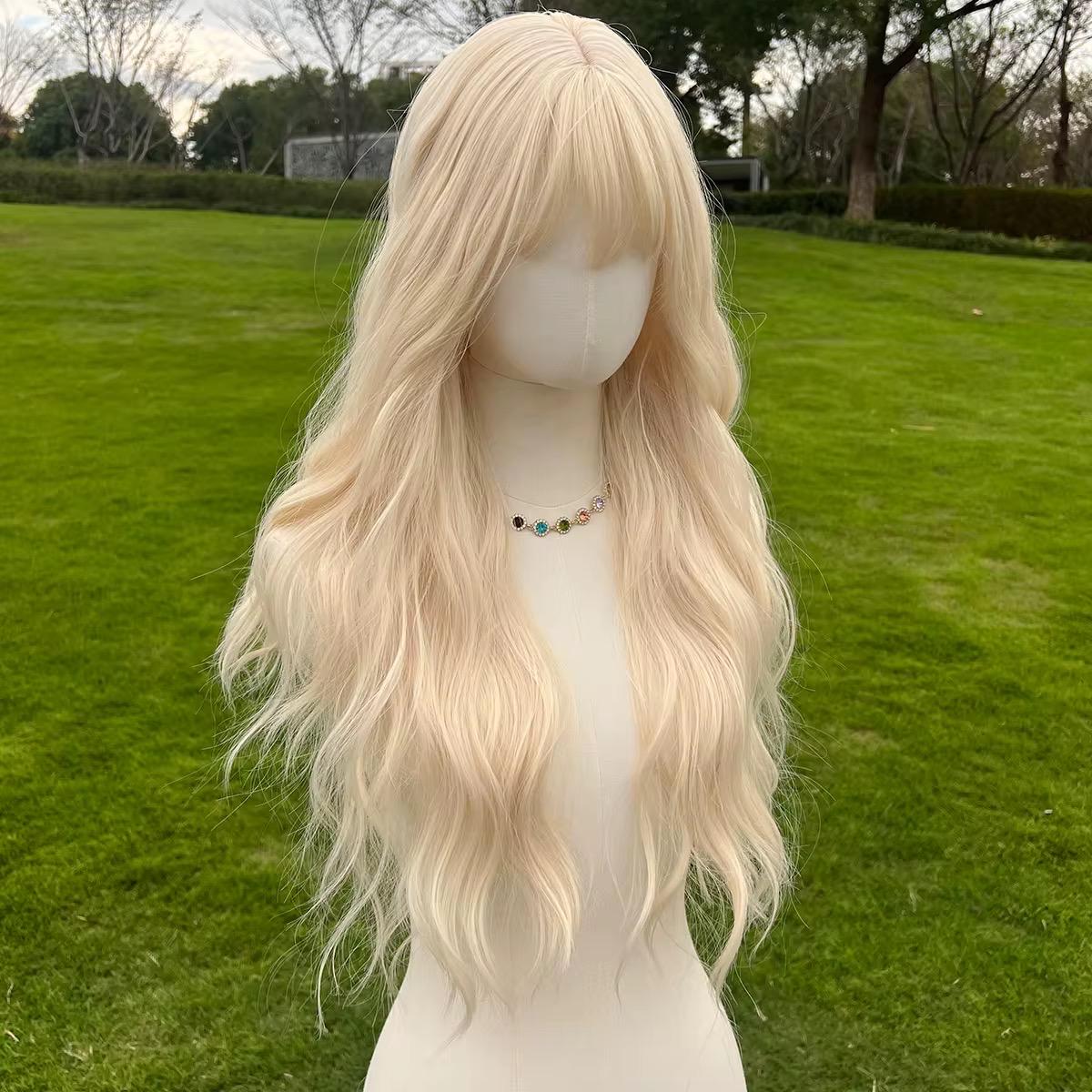 Perruque longue ondulée blonde platine avec frange - Cheveux d'aspect naturel résistants à la chaleur pour un look cosplay/dolly